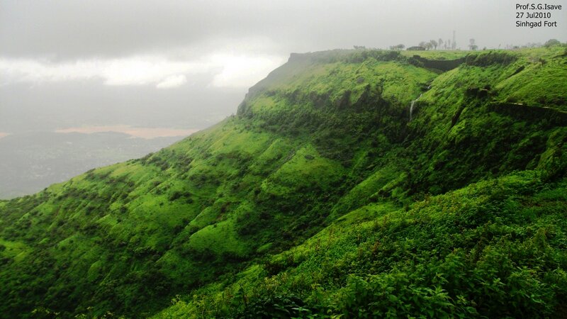 Green Hillside with Waterfall