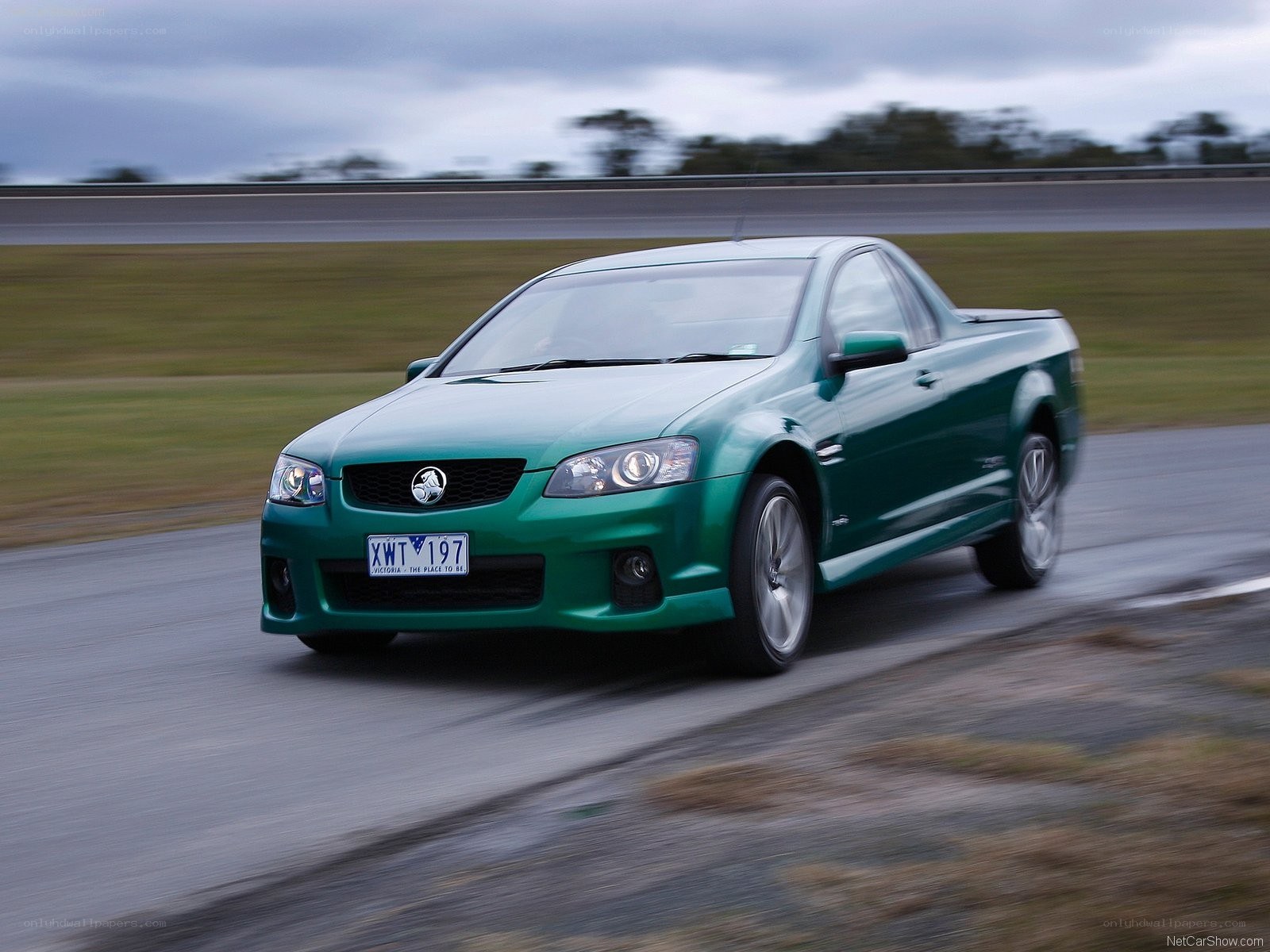 green Holden utility car