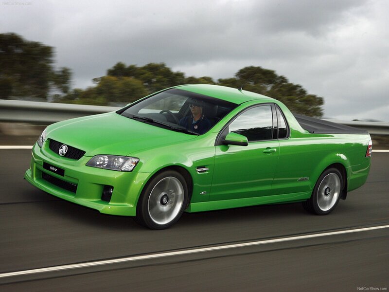 green Holden utility in motion