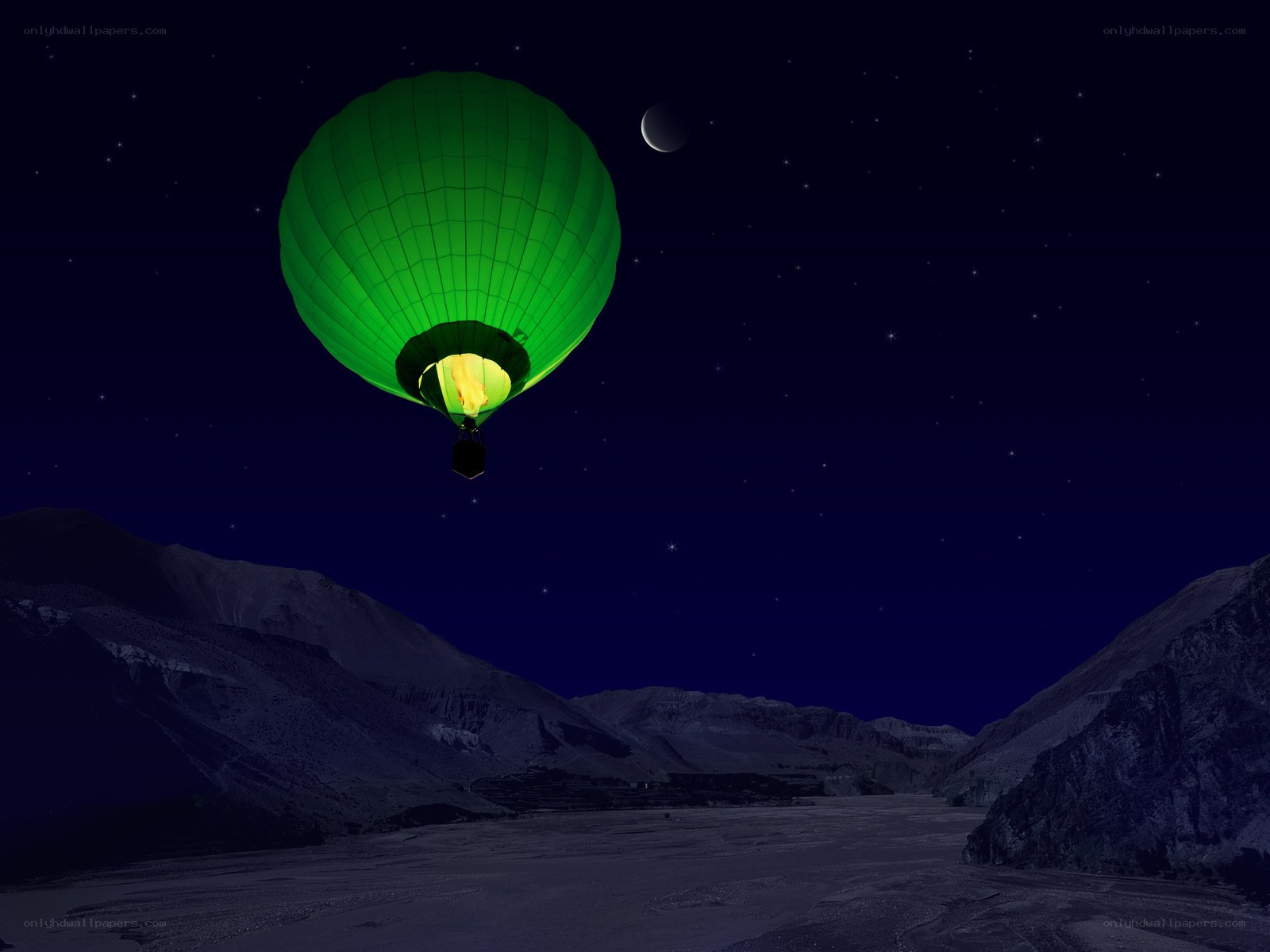 Green hot air balloon at night