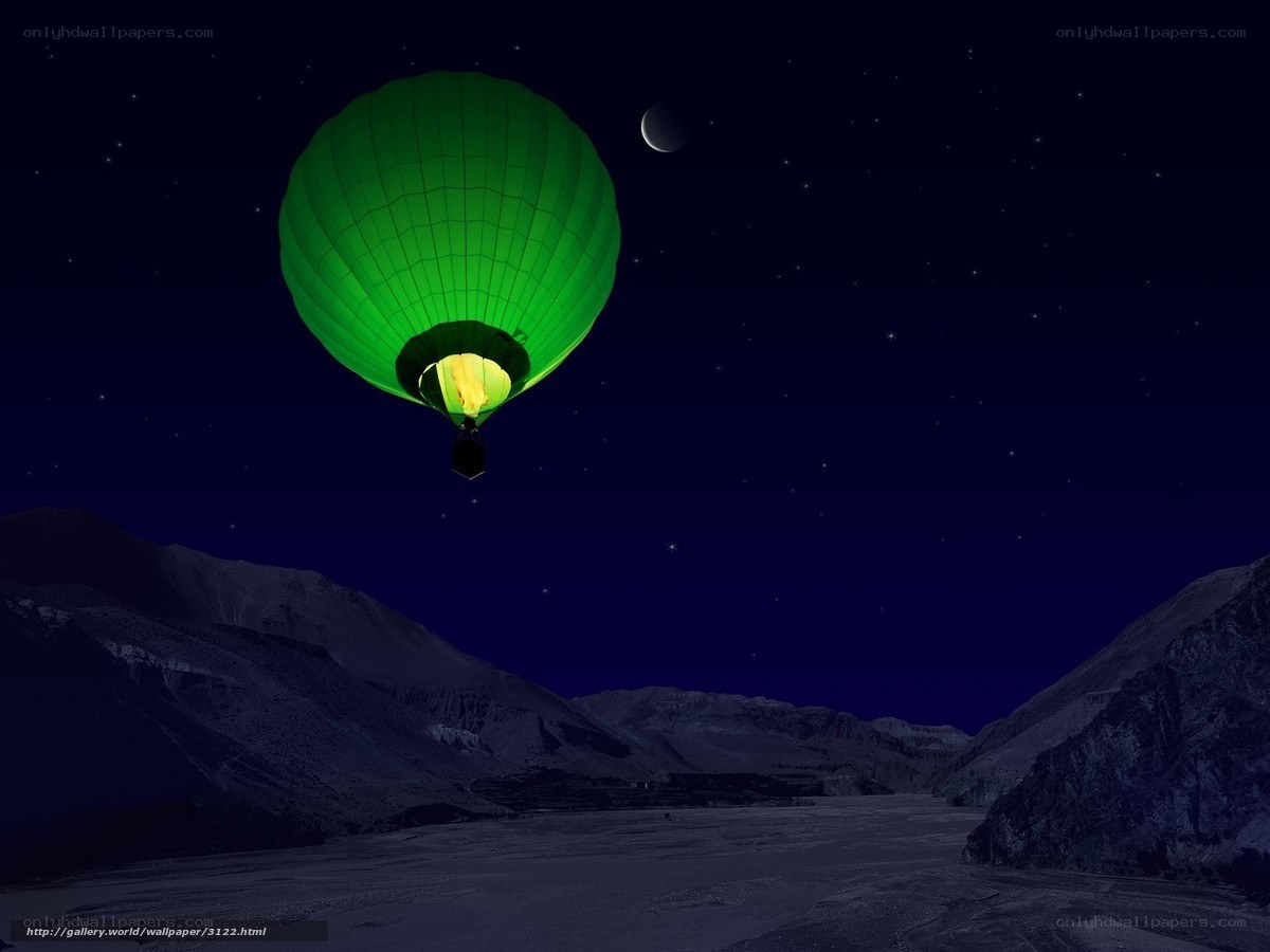 Green hot air balloon at night