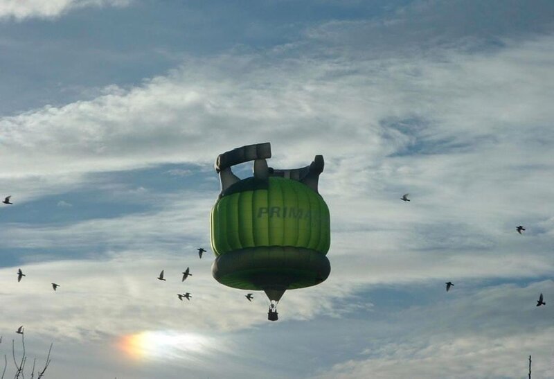 Green Hot Air Balloon — Serene, Afternoon, Photograph