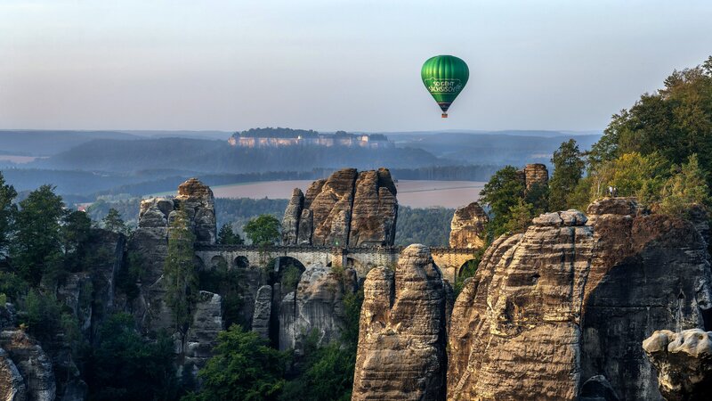 Green Hot Air Balloon — Serene, Morning, Photograph, Rock Formations