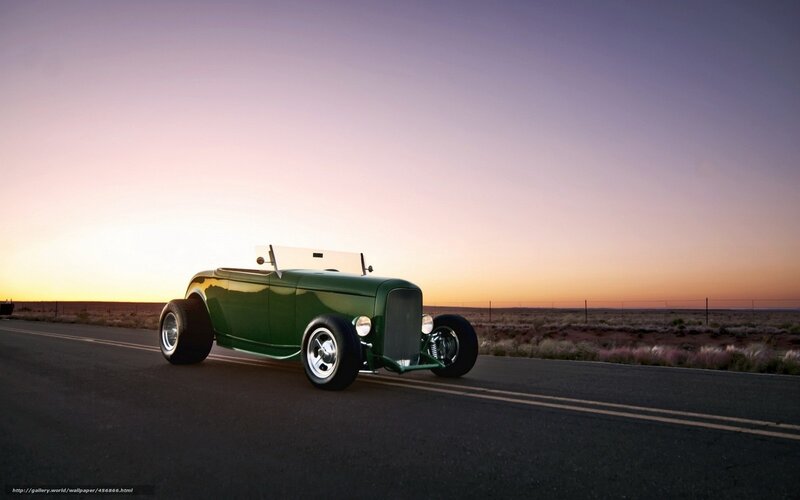 Green hot rod on desert road