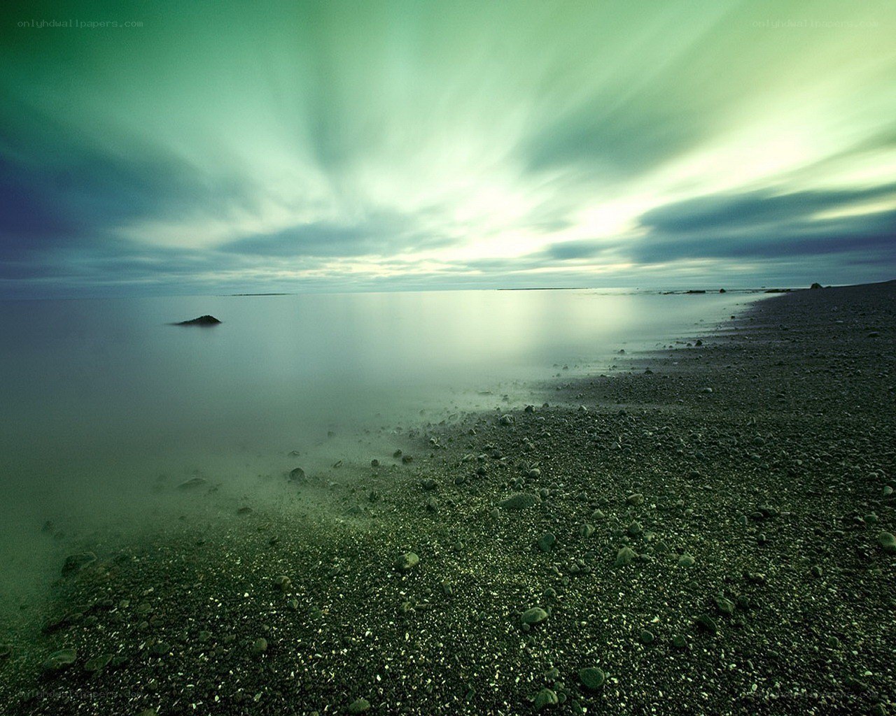 Green-hued coastal landscape