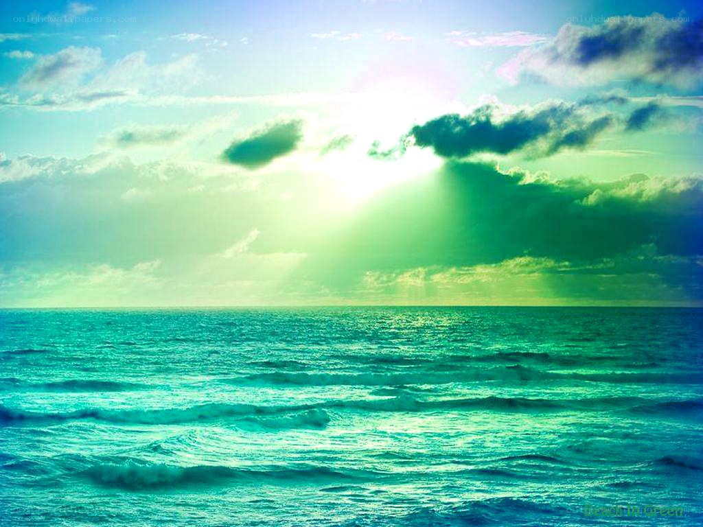 Green-hued ocean sunset