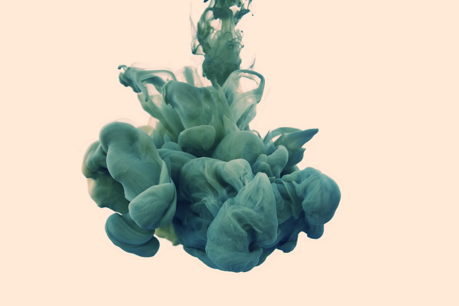 green ink cloud in water