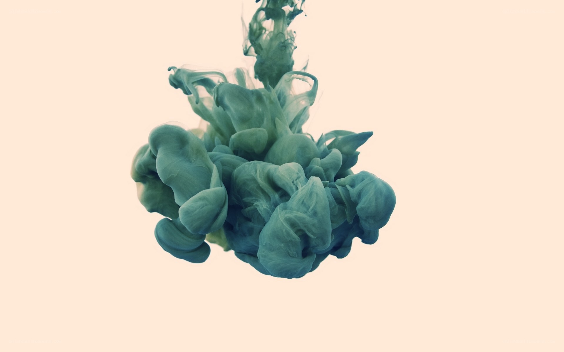 green ink cloud in water