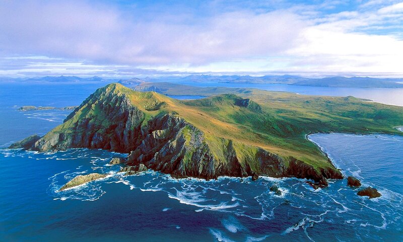 Green Island in Ocean — Blue, Serene, Afternoon, Photograph, Mountains