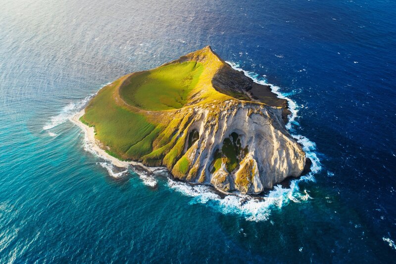 Green Island in Ocean — Blue, Serene, Afternoon, Photograph