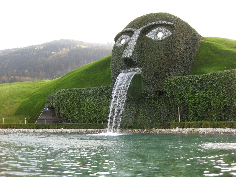 Green Ivy-covered Head