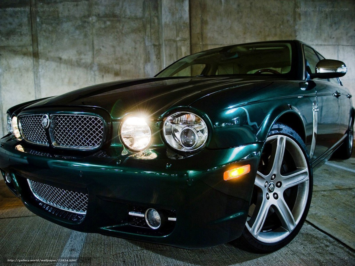 Green Jaguar in Garage