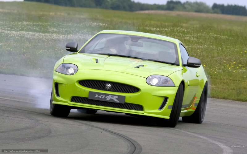 green jaguar xkr drifting