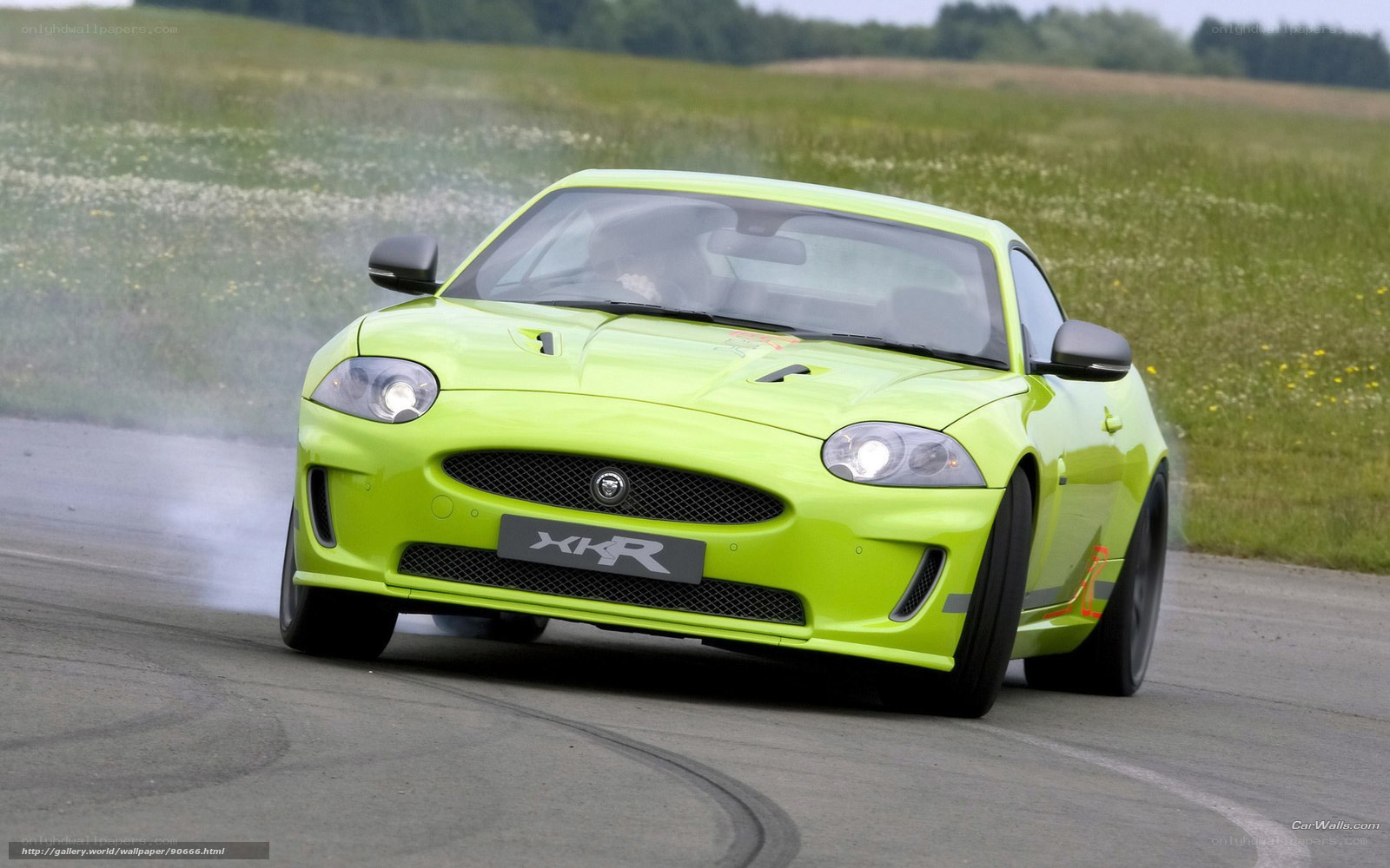 green jaguar xkr drifting