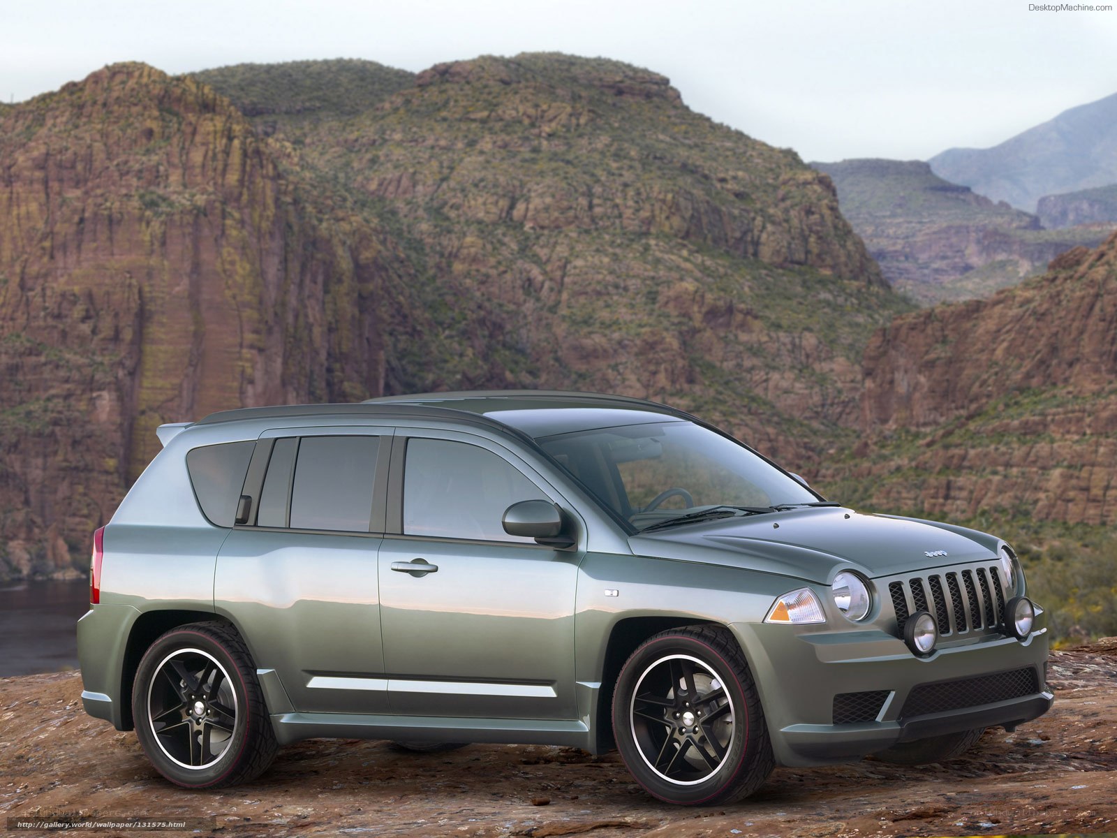Green Jeep Compass in desert