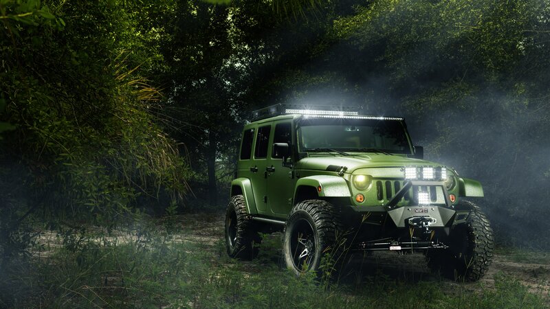 Green Jeep in Forest — Dramatic