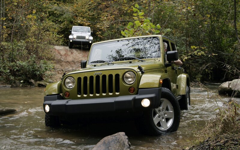 Green Jeep in Water