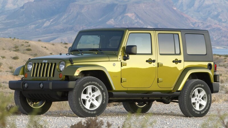 green jeep wrangler in desert