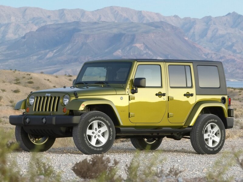 Green Jeep Wrangler — Yellow, Arid, Afternoon