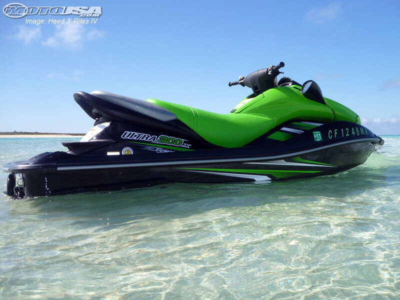 Green Jet Ski in Water — Serene