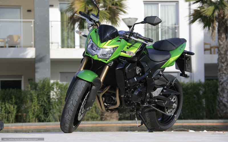 Green Kawasaki Motorcycle — Calm, Afternoon, Photograph, Building