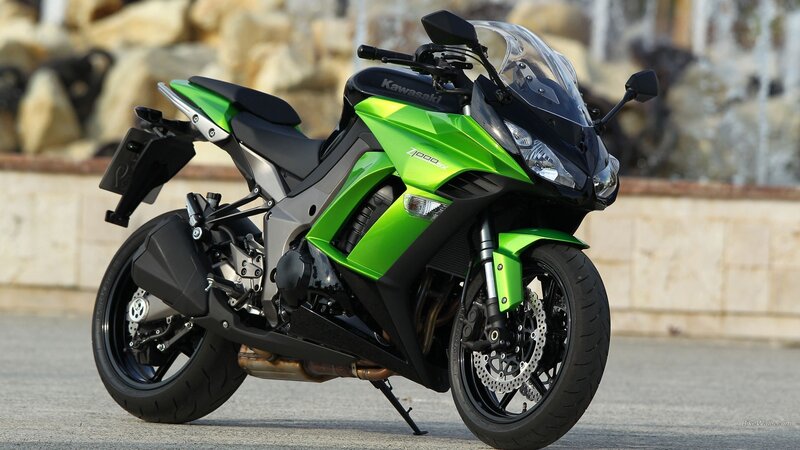 Green Kawasaki Motorcycle — Neutral, Afternoon, Photograph, Stone Wall