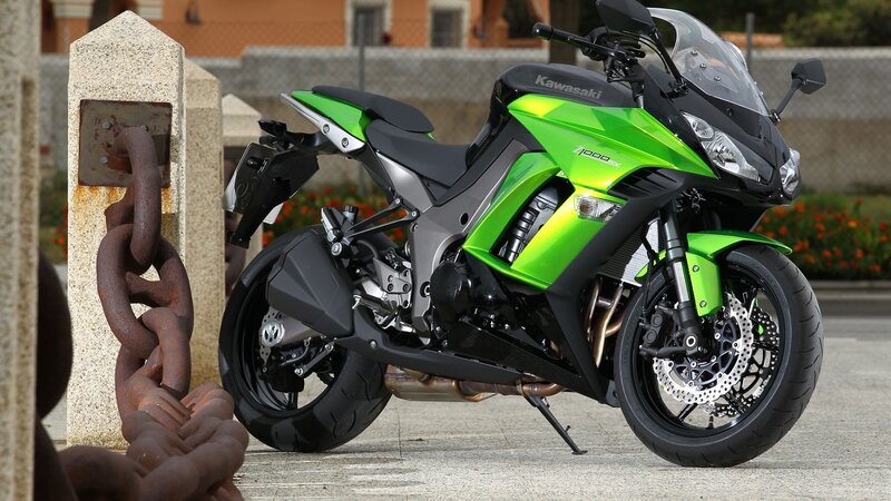 Green Kawasaki motorcycle parked