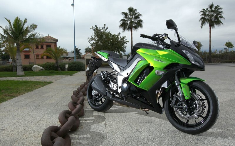 Green Kawasaki motorcycle parked