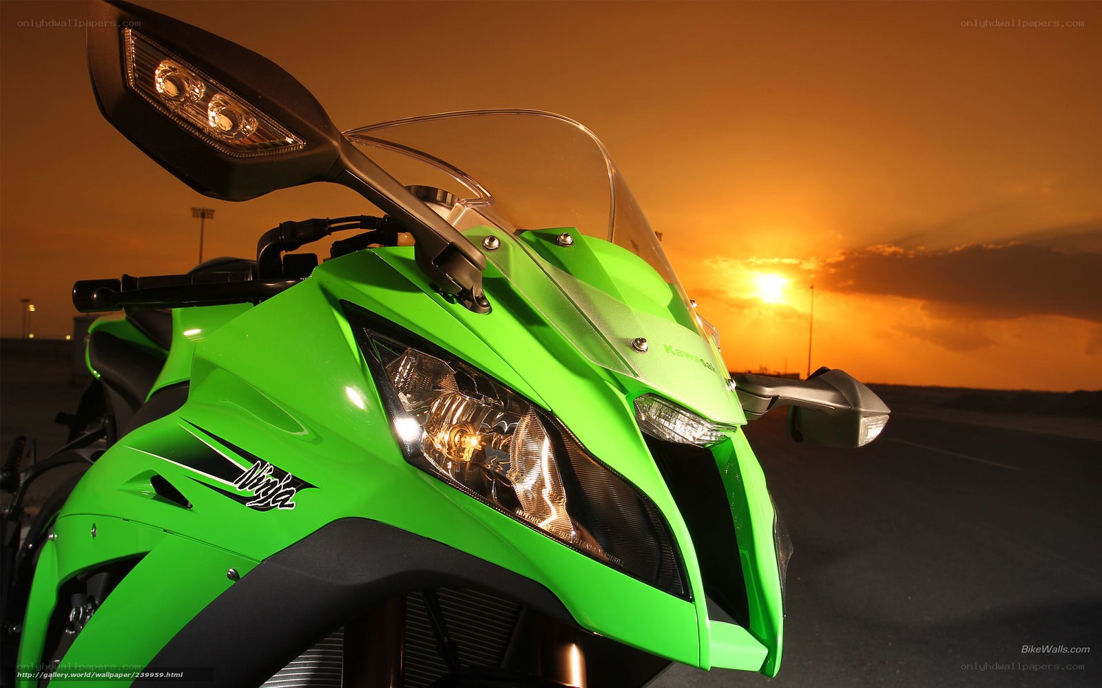 Green Kawasaki Ninja at sunset