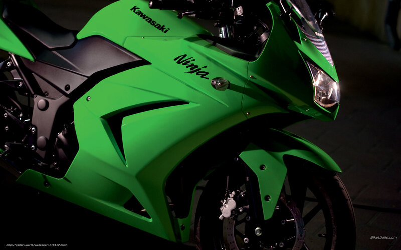 Green Kawasaki Ninja Motorcycle — Dramatic, Night