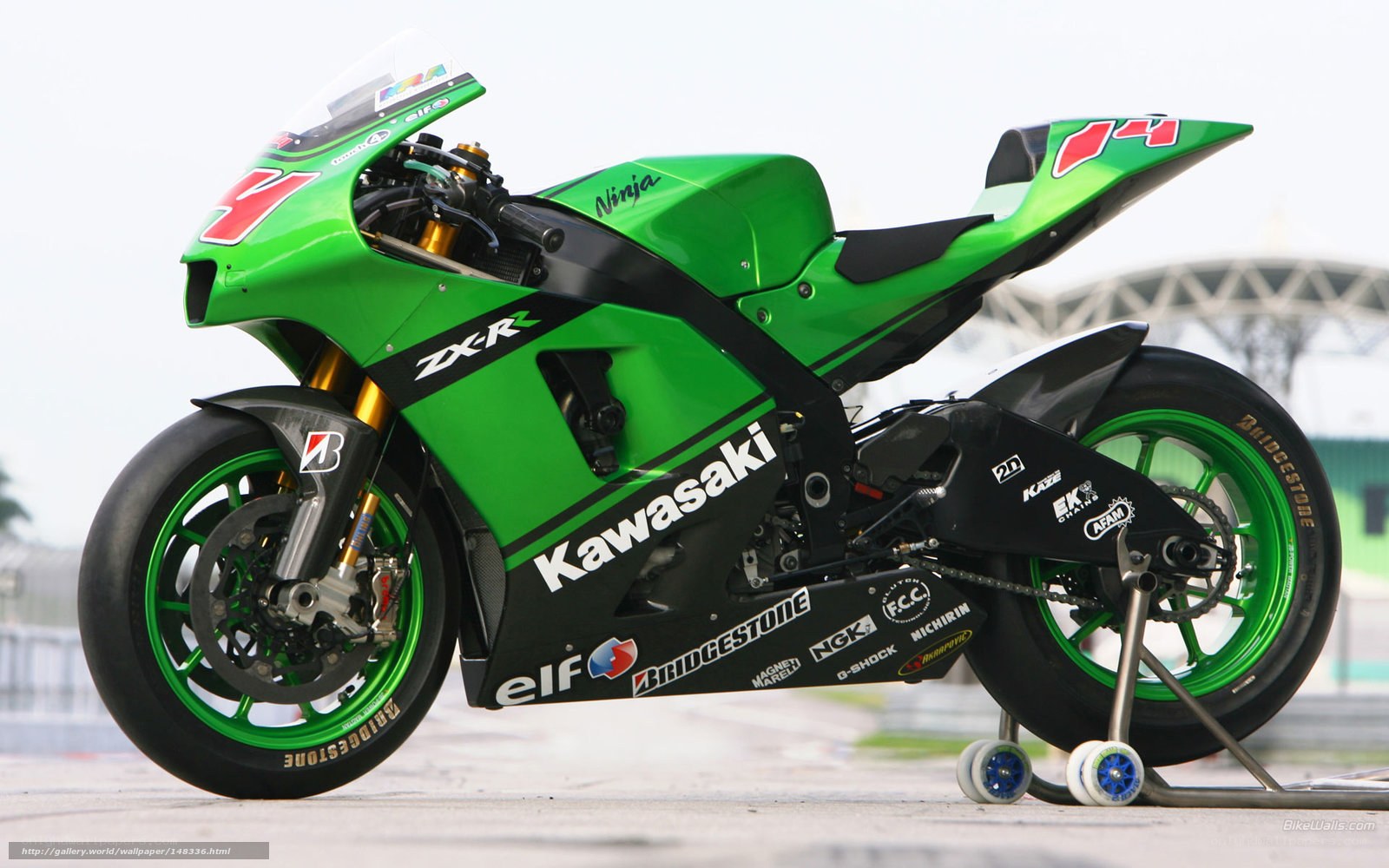 green kawasaki racing motorcycle
