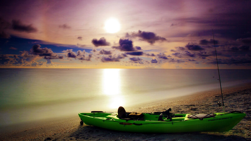 Green Kayak on Beach