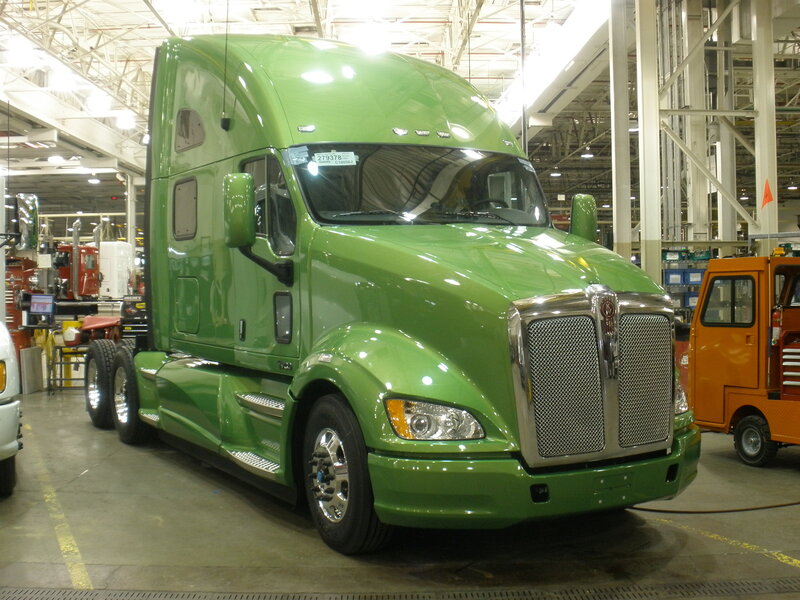 Green Kenworth truck in factory