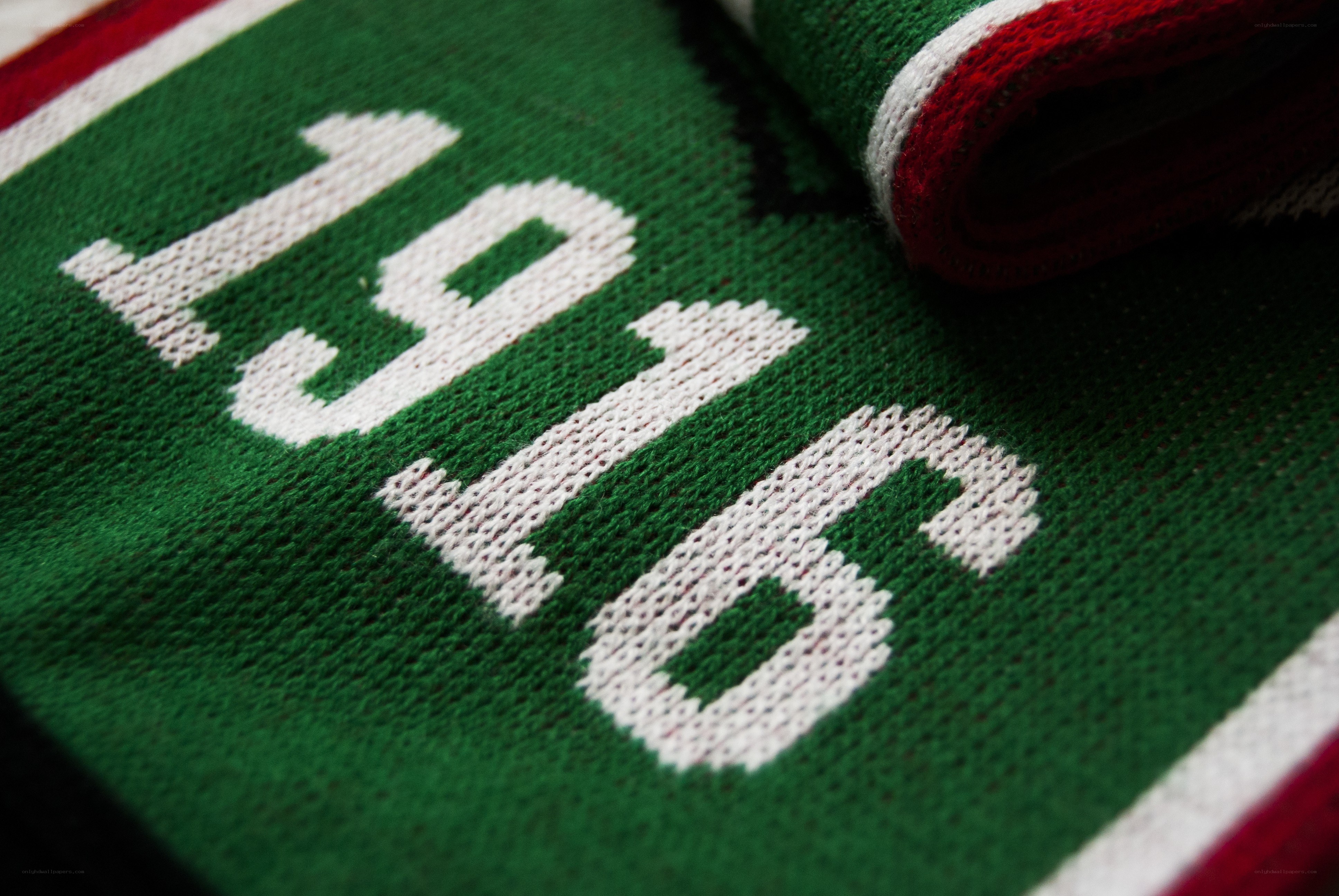 green knit fabric with numbers
