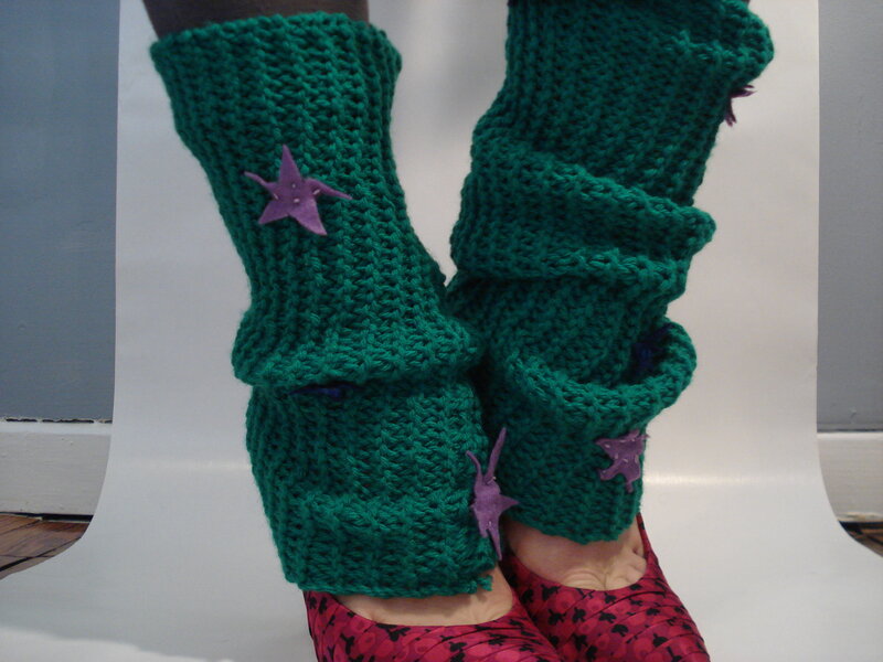 green knitted leg warmers