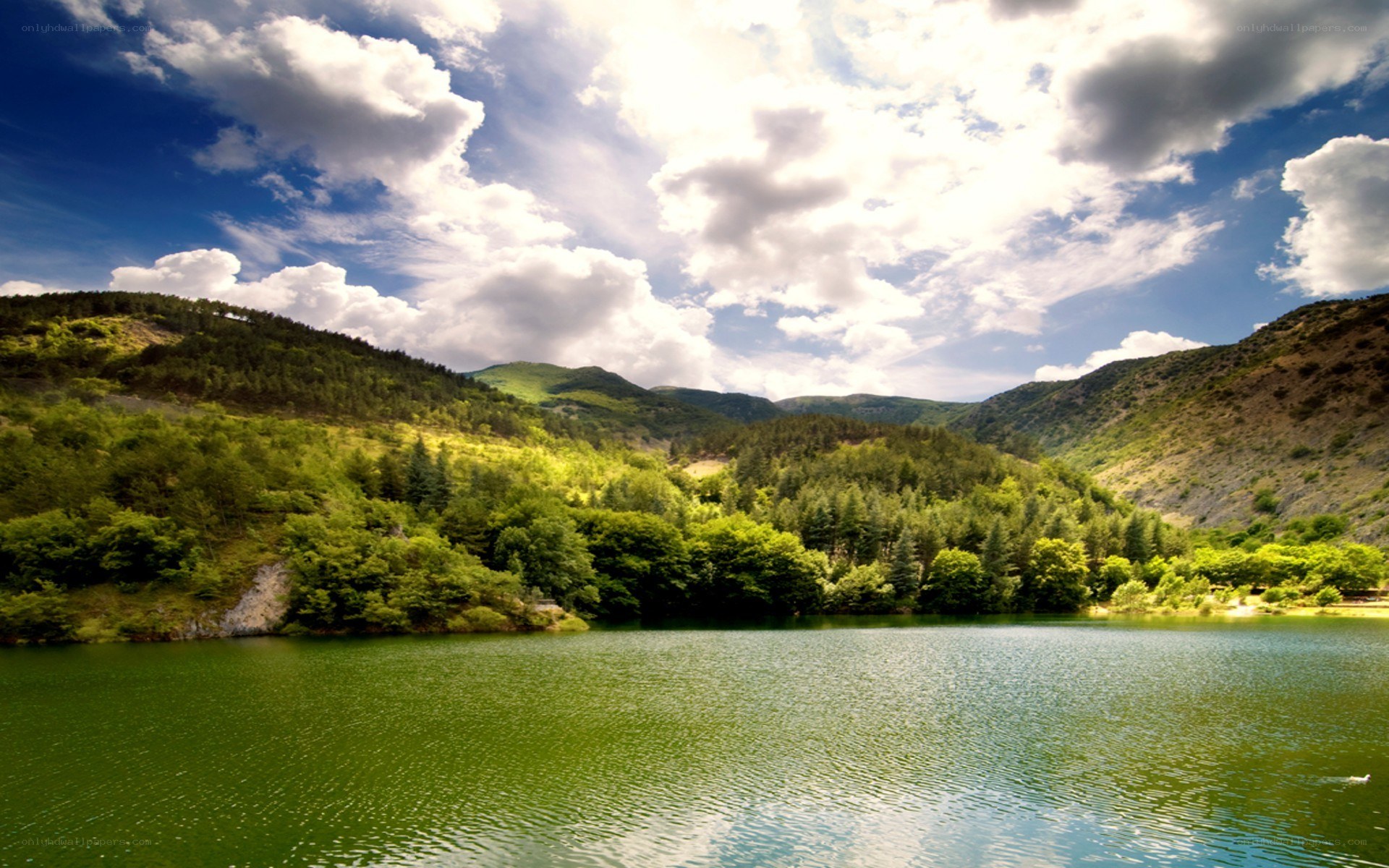 green lake in mountain valley