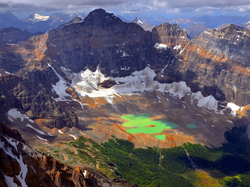 Green lake in mountain valley