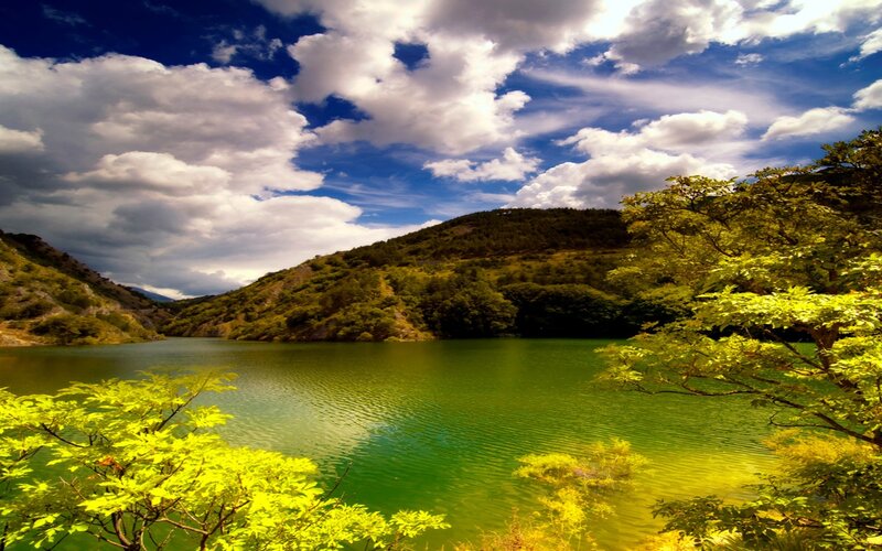 Green lake in mountain valley