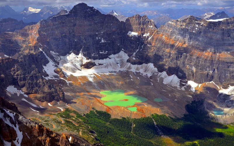 Green lake in mountain valley