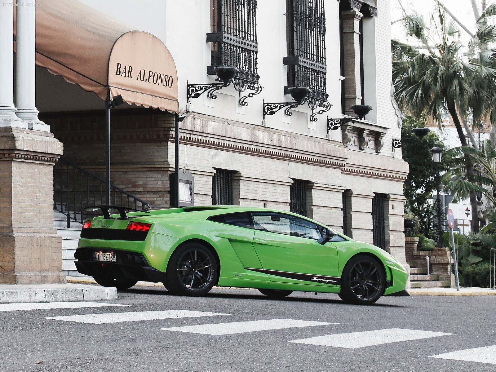 Green Lamborghini Gallardo parked