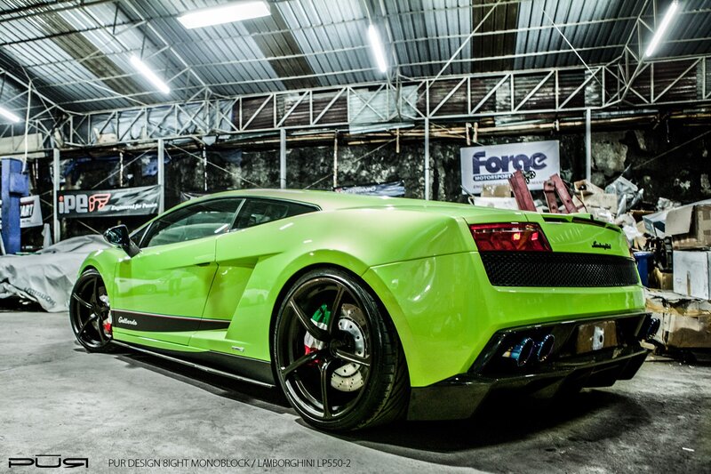 Green Lamborghini in garage