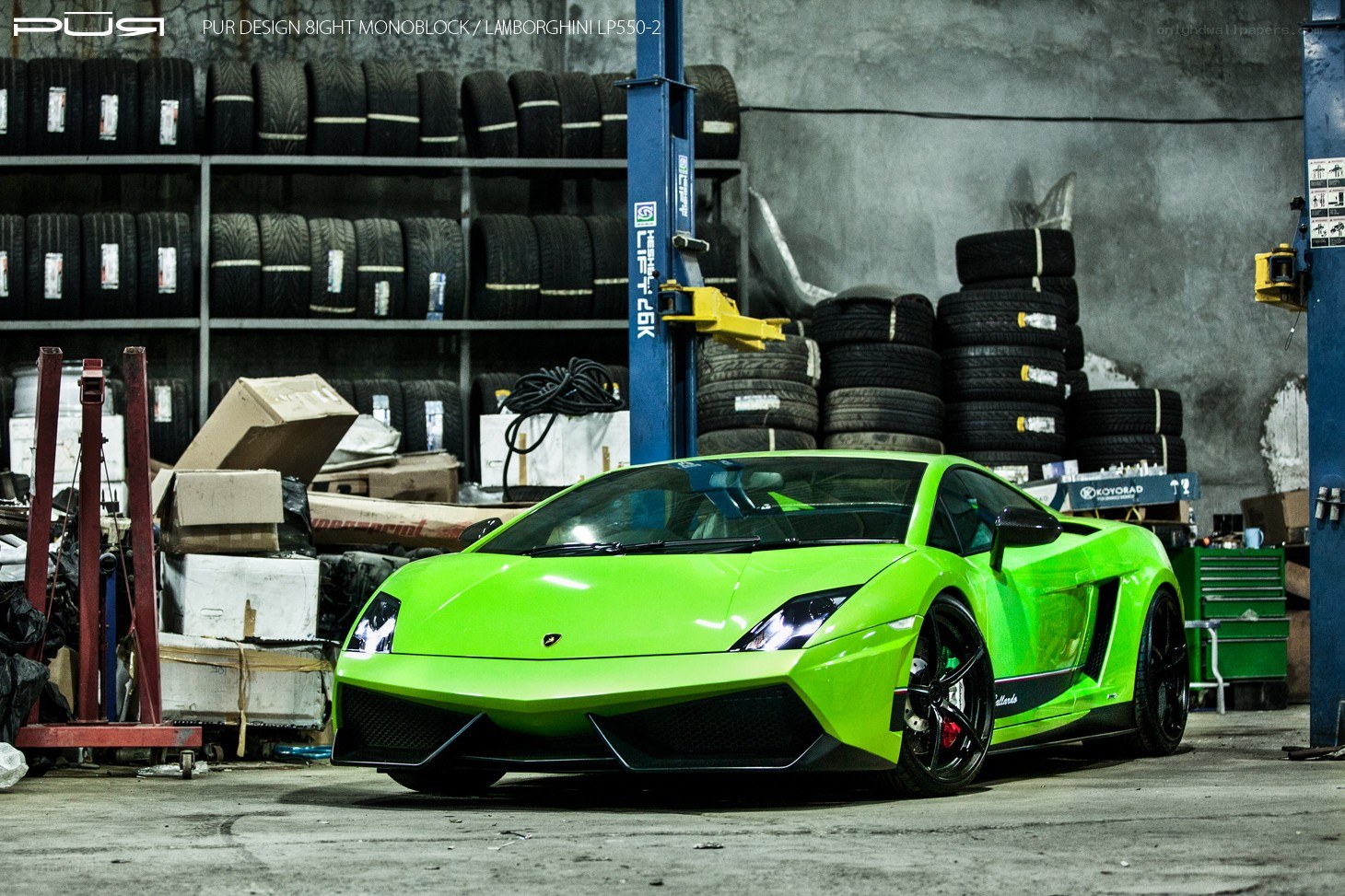 Green Lamborghini in garage