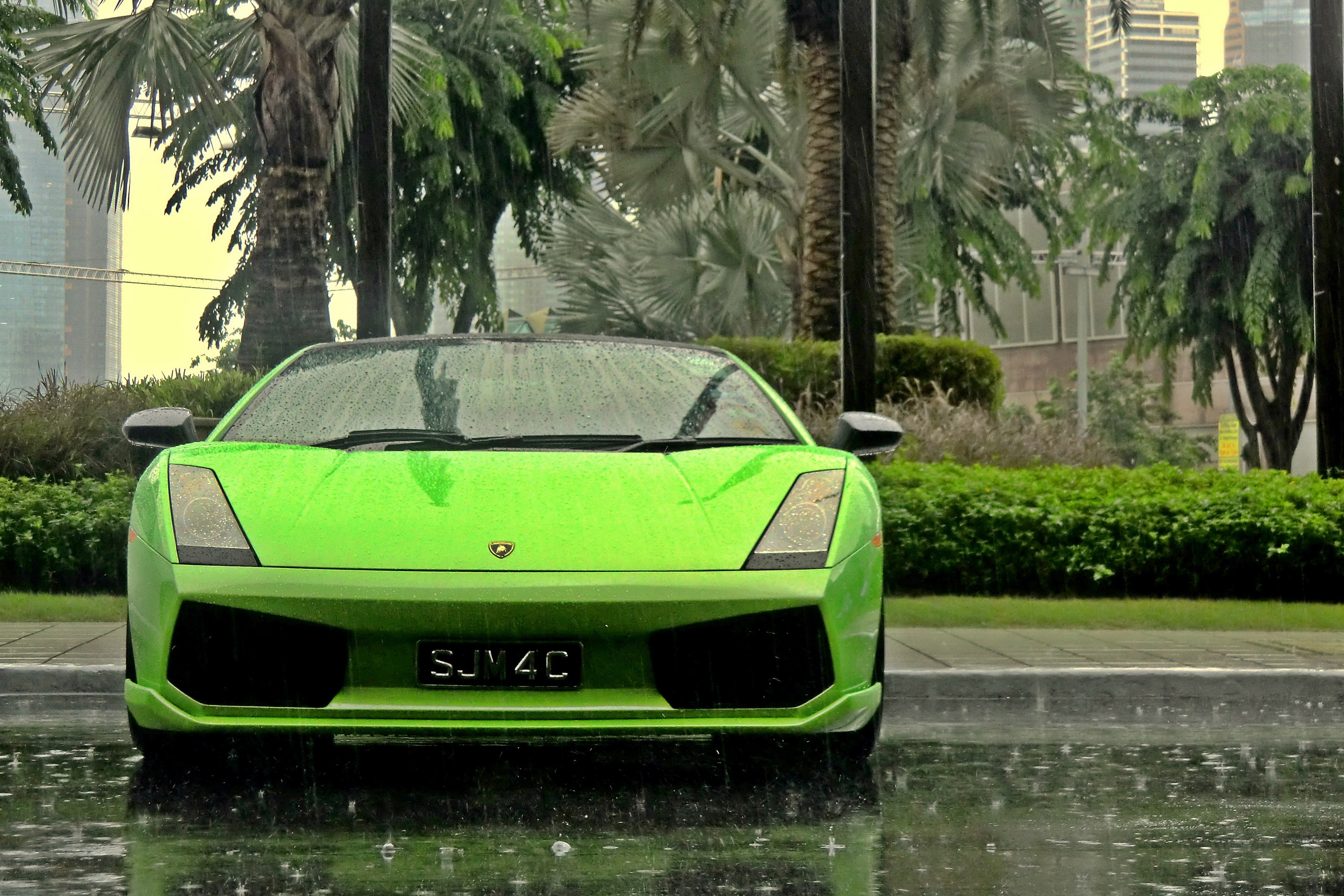 Green Lamborghini in the rain