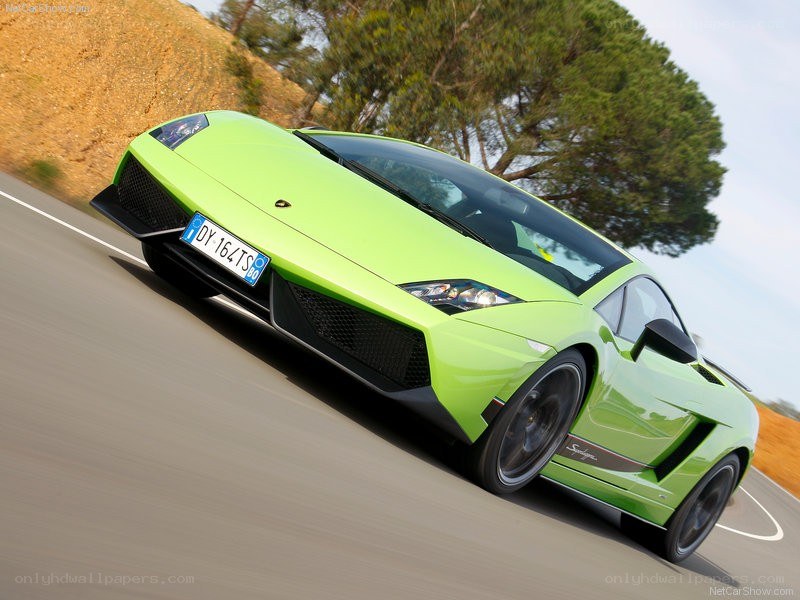 green lamborghini on a road