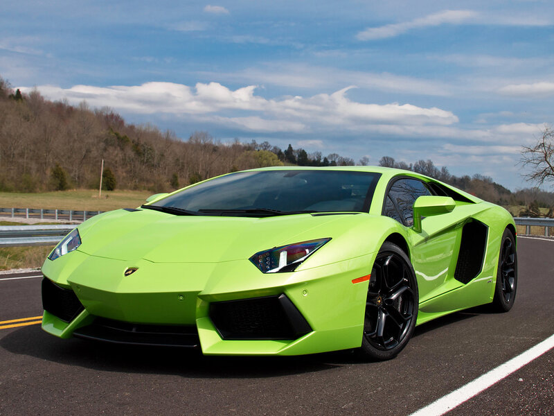 Green Lamborghini on a road
