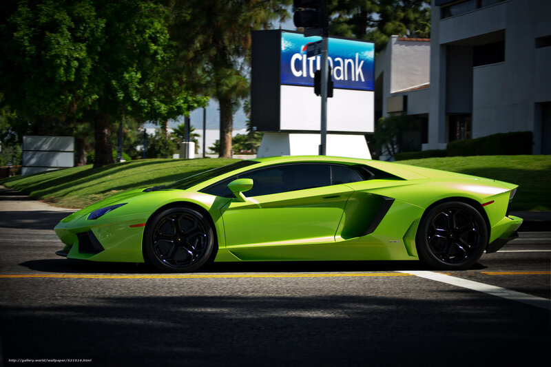 Green Lamborghini on city street