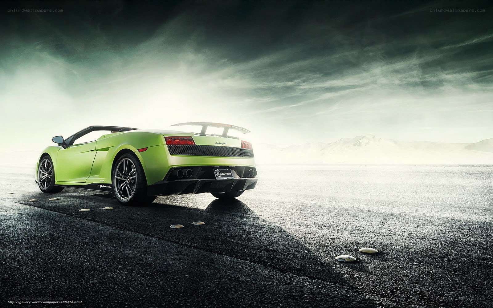 Green Lamborghini on desert road