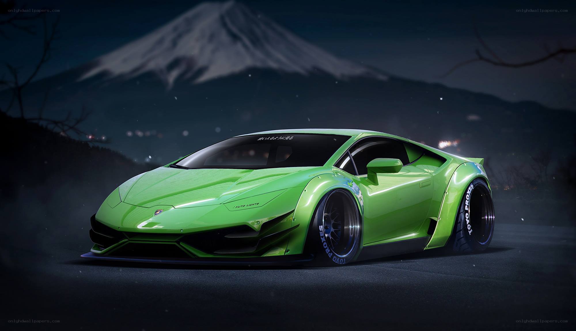 Green Lamborghini on mountain road