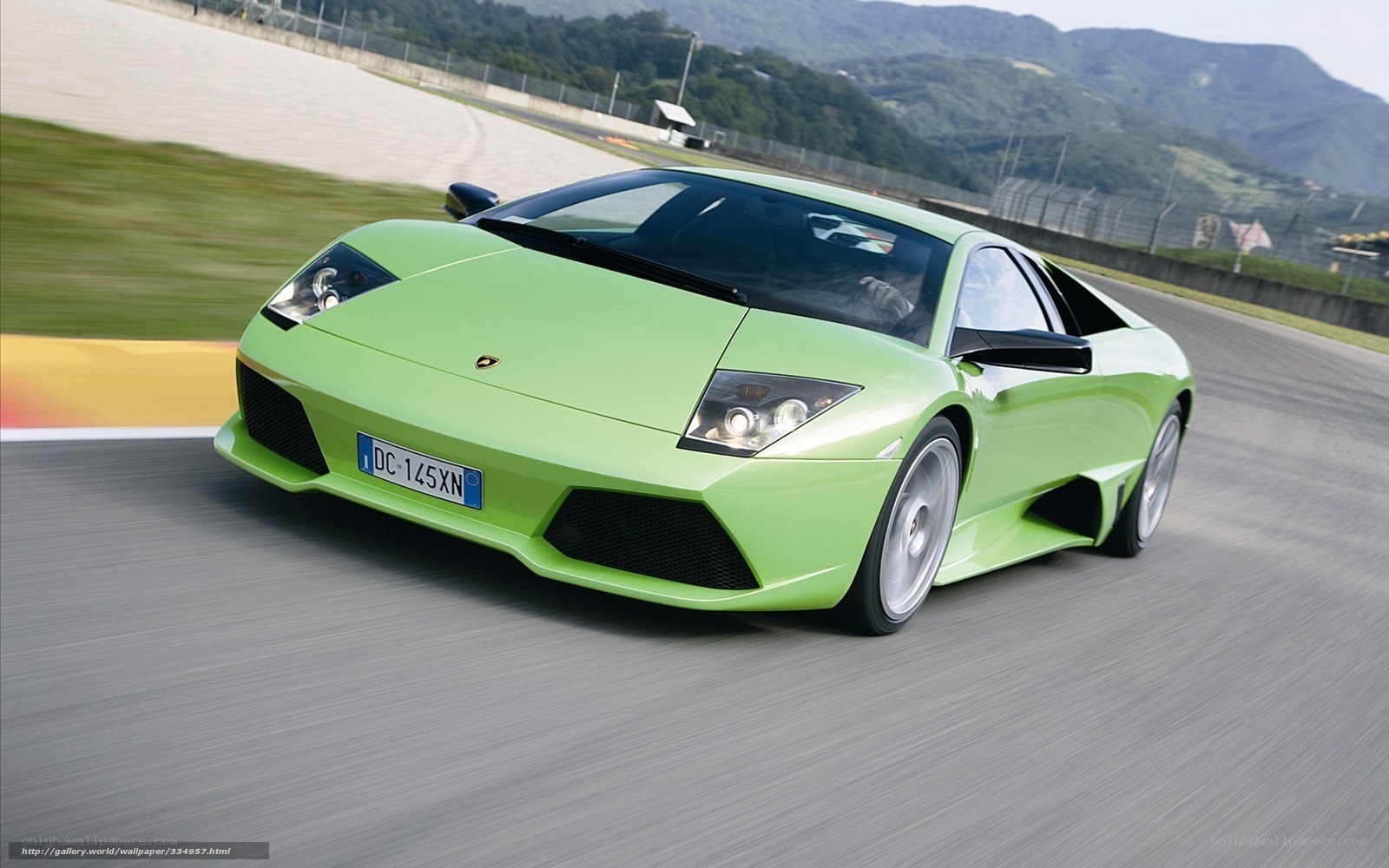 Green Lamborghini on racetrack
