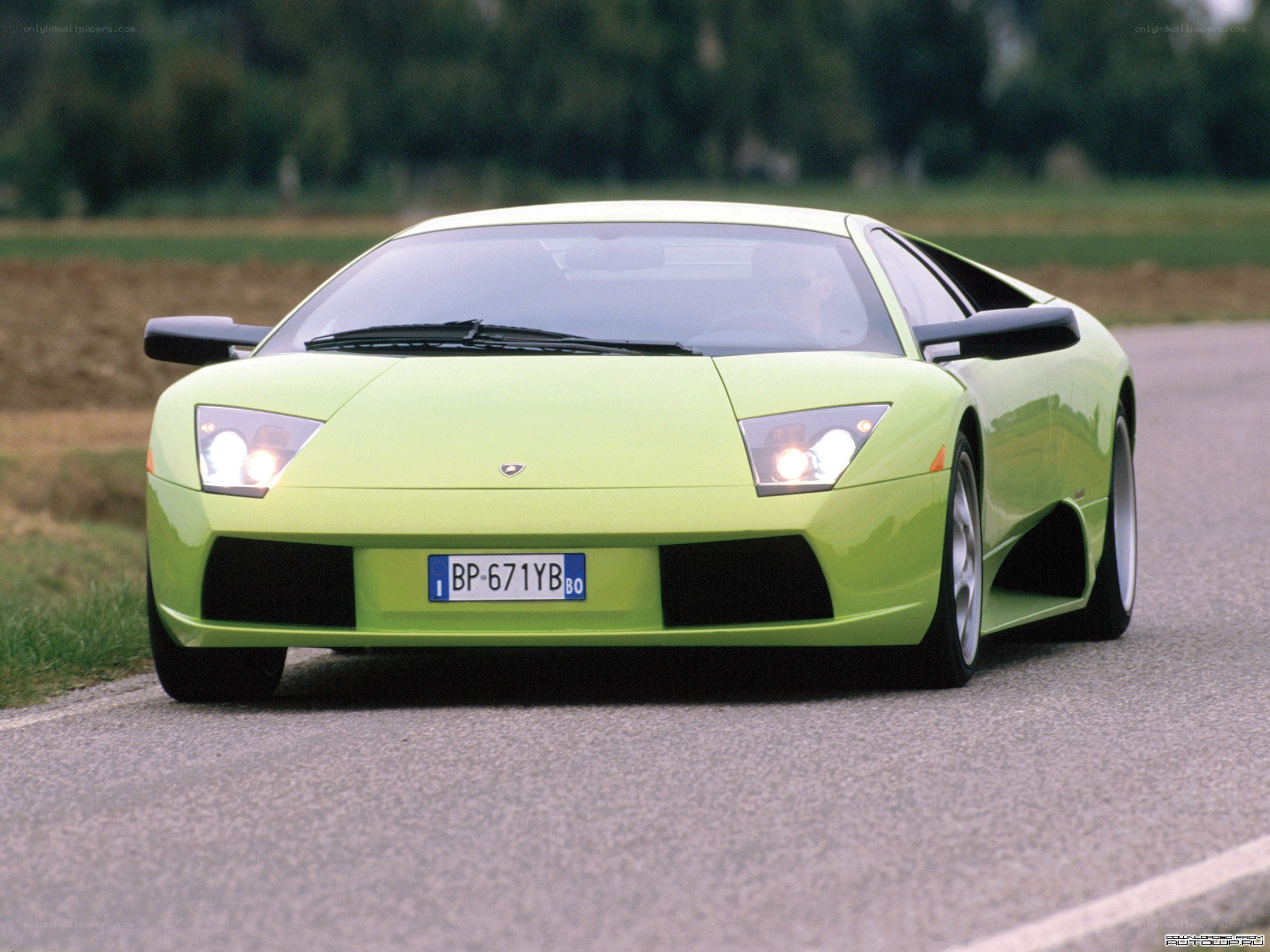 green lamborghini on road